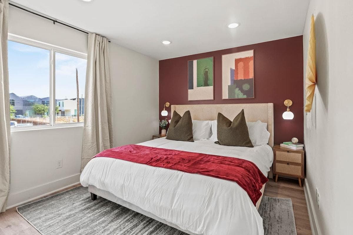 Step into luxury with our beautifully designed bedroom, featuring a sumptuous king-size bed that promises a restful night's sleep.