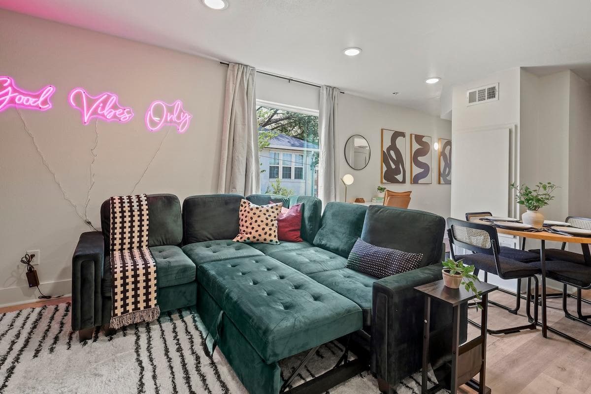 This bright, airy space features a modern pull-out couch that comfortably sleeps 2, making it perfect for extra guests or family members.