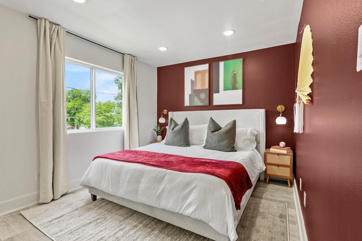 Step into luxury with our beautifully designed bedroom, featuring a sumptuous king-size bed that promises a restful night's sleep.